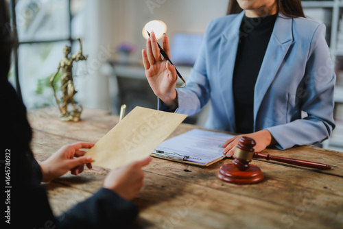 Fototapet Lawyer refusing bribe offered by client during meeting in office