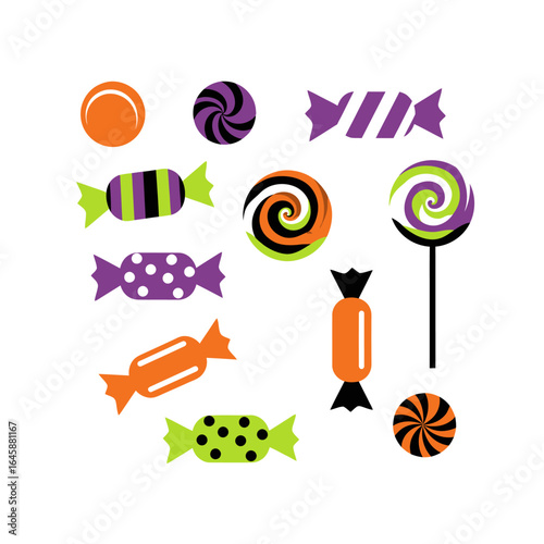 An assortment of Halloween-themed candies and lollipops.