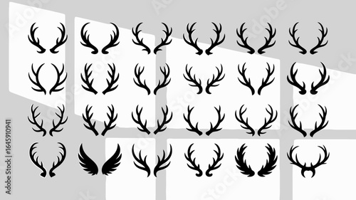 Collection of decorative antler and wing silhouettes for design