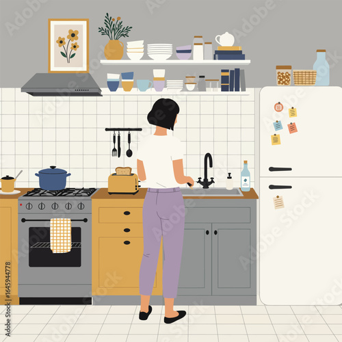 A woman stands in a cozy kitchen with a vintage refrigerator, oven, and various cooking utensils, creating a warm and inviting domestic scene