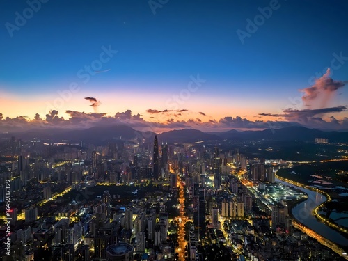 Wallpaper Mural Shenzhen skyline glows during warm summer twilight highlighting urban beauty Torontodigital.ca