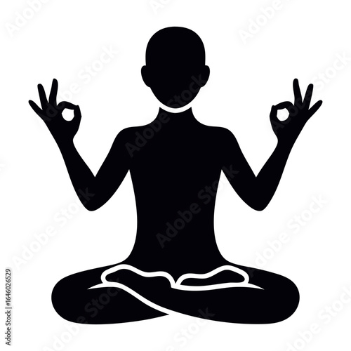 Silhouette of a person meditating in a lotus pose with mudras