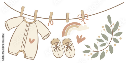 whimsical baby clothes clothesline illustration with booties and botanical elements for nursery decor isolated on white background/