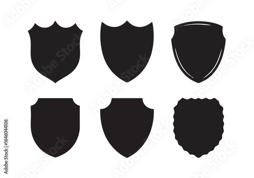 Diverse Collection of Black Shield Silhouettes for Security and Protection Design Projects and Heraldic Emblems on Clean White Background