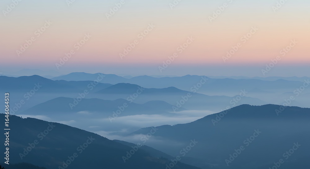 Fototapeta premium Misty mountain horizon at dawn, cool blue and gray tones, serene backdrop