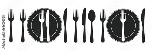 Elegant dining table setting: forks, knives, and spoons arranged with plates for formal occasions
