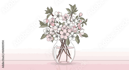 Elegant floral arrangement in a glass vase showcasing spring blossoms on pink surface