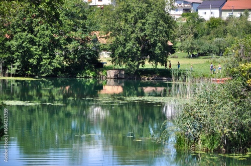 Calm water during summer at Mreznica river near Karlovac city.River in the deep forest. Mreznica river near Duga Resa. Croatia.