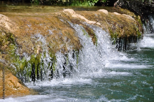 small waterfall in the forest.