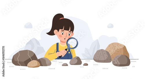 Young geologist exploring rocks with a magnifying glass in a mountain setting concept for education and geology fieldwork