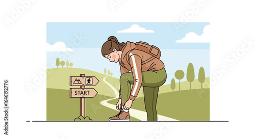 Young woman getting ready for hike tying shoelaces on a trail with signpost