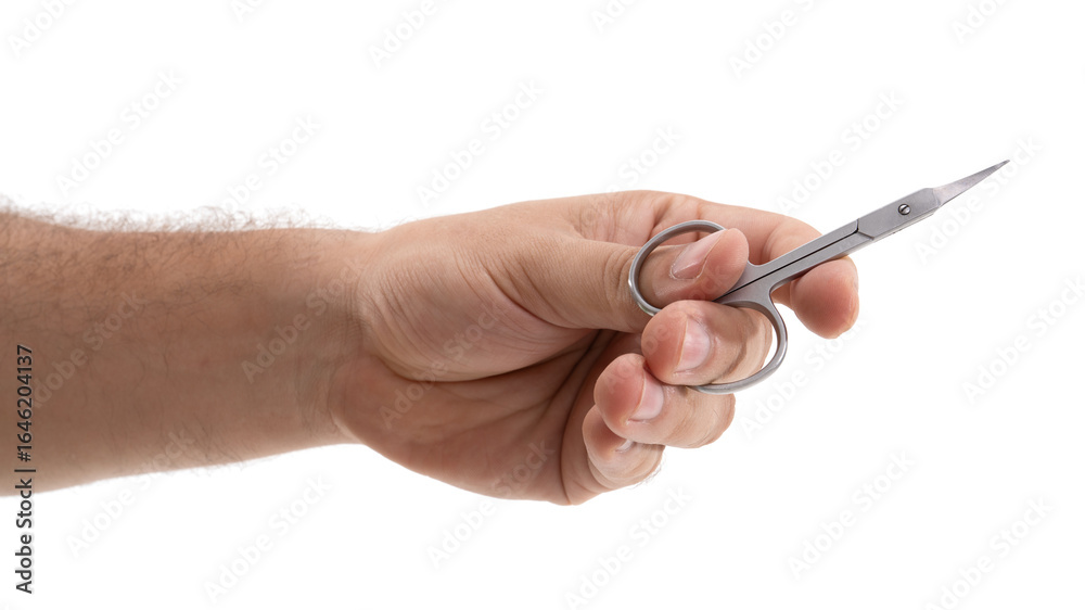 Close-up of a hand holding a pair of scissors against a white background showing detailed focus and precision in simple tools Close-up of a hand holding a pair of scissors against a white background showing detailed focus and precision in simple tools