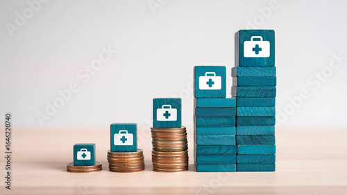 Growing medical costs represented by rising stacks of coins and medical bag icons symbolizing healthcare expenses.