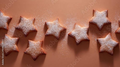 Star-shaped cookies dusted with powdered sugar on a brown background  