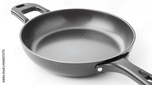 Nonstick fry pan with ergonomic handle and smooth cooking surface isolated on white background
