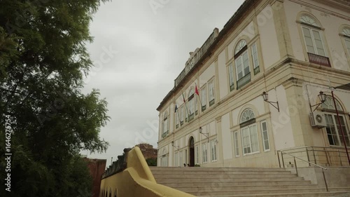 Historic municipal building with flags in Silves, Algarve, Portugal