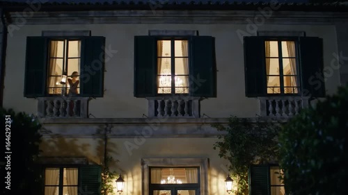 Elegant villa at night with illuminated windows