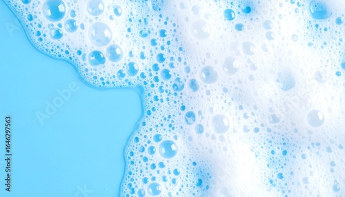 Laundry detergent suds on a light blue surface