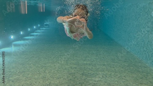  swimming in a pool - hotel concept
