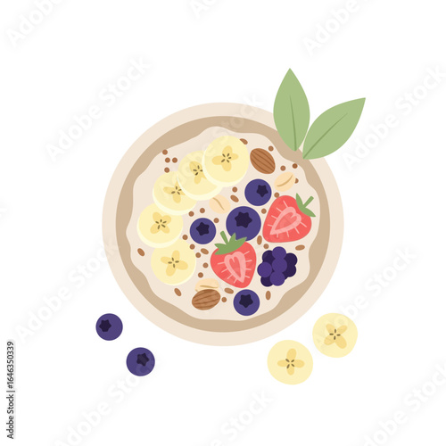 Energizing breakfast bowl with fresh fruit, banana slices, juicy strawberries, and plump blueberries promises a delicious and healthy start to your day, a delightful vegan treat