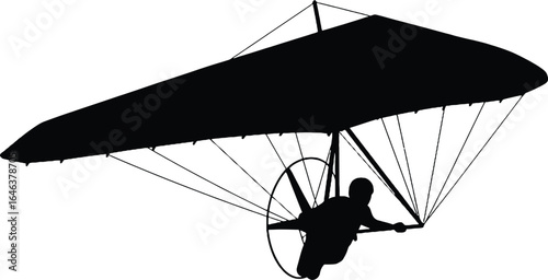 Soar with freedom, a silhouette of a person gracefully hang gliding across the sky, experiencing pure exhilaration and adventure.