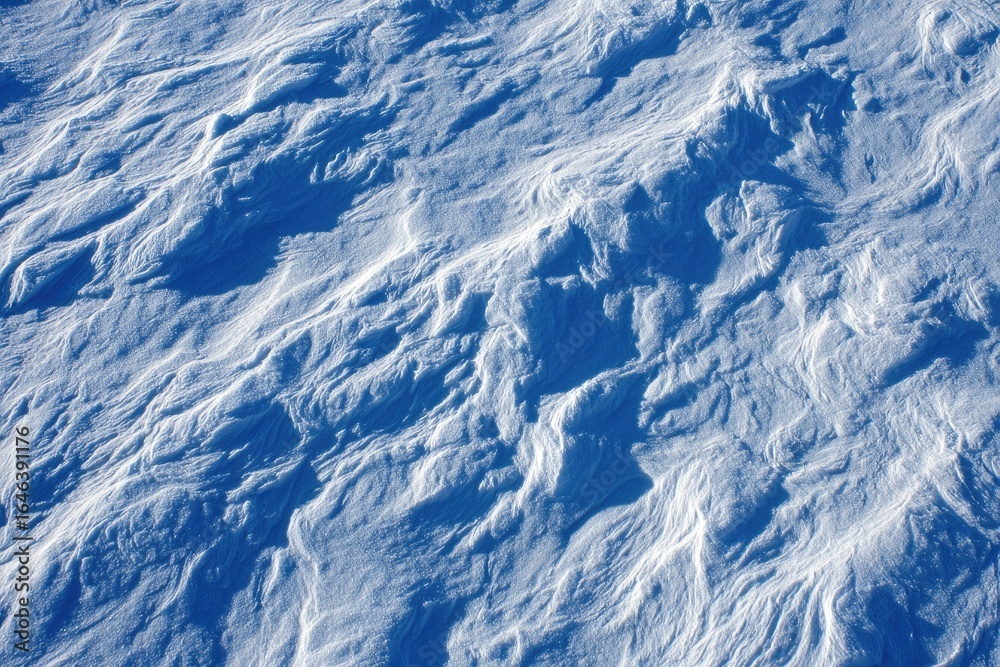 Wind-sculpted snow, textured close-up Wind-sculpted snow, textured close-up