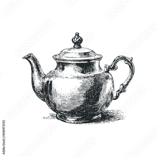 Antique silver teapot with decorative handle and lid