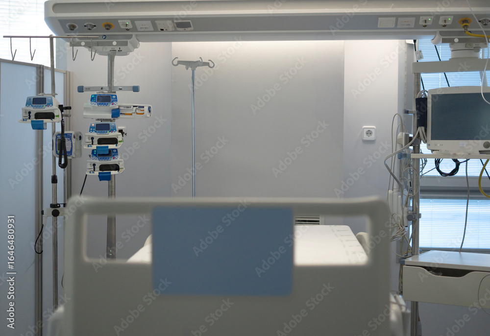 Empty hospital bed awaiting patient in modern clinic room Empty hospital bed awaiting patient in modern clinic room