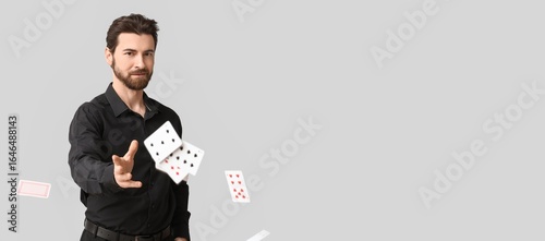 Handsome male poker player ...