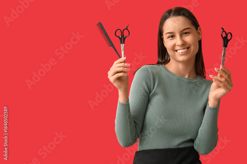 Female hairdresser with sci...
