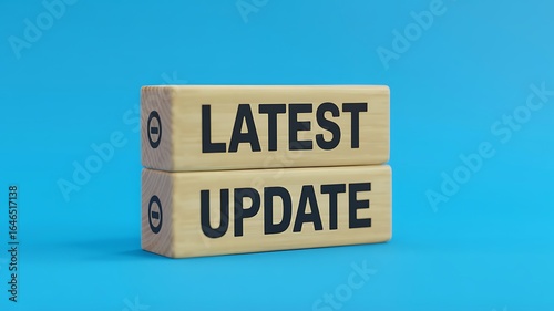 Two wooden blocks stacked vertically with the words latest update printed in bold black letters against a vibrant blue background