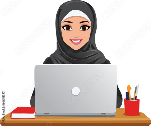 Woman in hijab working on a laptop at a desk computer
