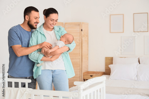 Happy parents with their li...