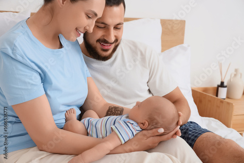 Happy parents with their li...