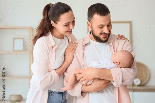 Happy parents with their li...