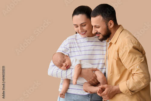 Happy parents with their li...