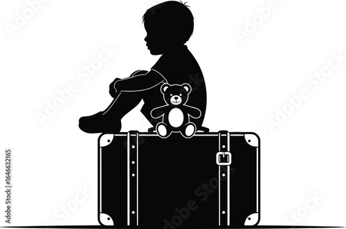 Silhouette of a child sitting a suitcase at airport, waiting for his flight, boy is accompanied by his teddy bear toy