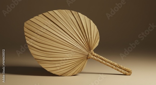 Beige Palm Leaf Hand Fan on Neutral Background