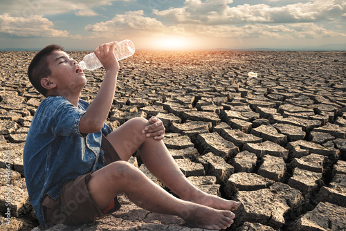Severe drought and lack of drinking water forcing people to endure scorching heat, dry land, and starvation while desperately.
