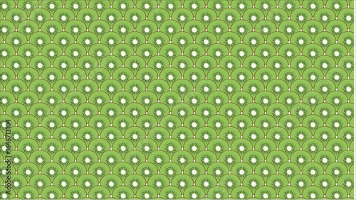 A beautifully detailed overhead shot of a single slice of kiwi, highlighting the texture of the green flesh and the arrangement of black seeds around the core.