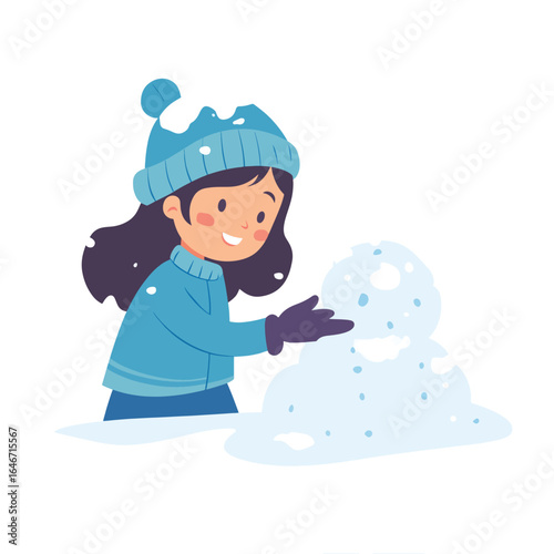 Smiling girl in blue hat and sweater building a lumpy snowman with mittens