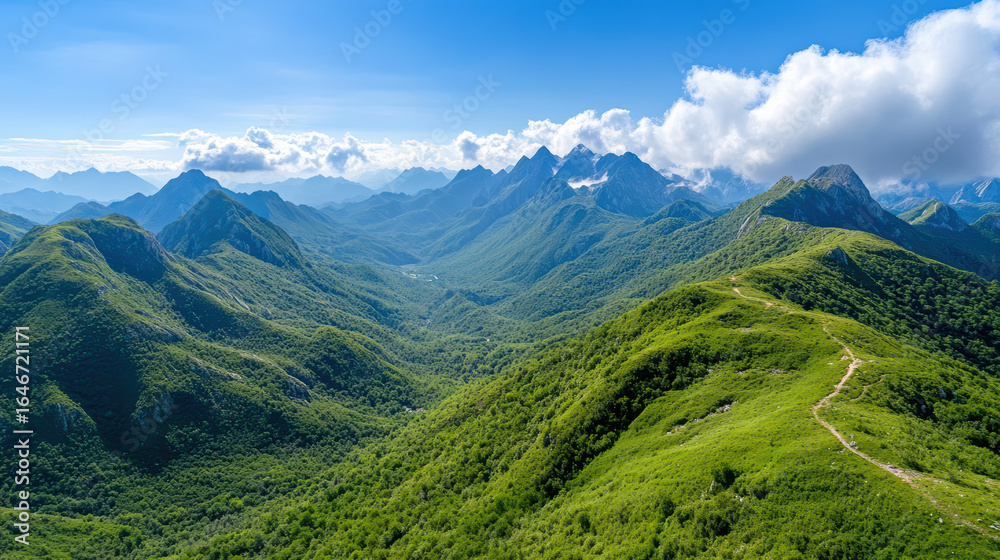 Fototapeta premium Lush green mountains and valleys stretch bright blue sky, showcasing nature beauty and serenity