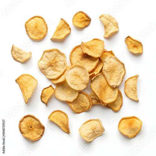 Randomly scattered dried parsnip chips, isolated for visual emphasis. Ideal for food packaging