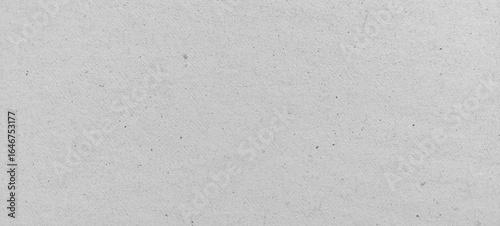 White recycled cardboard texture background. Clean white paperboard texture for packaging and design concepts. Soft paper natural style.