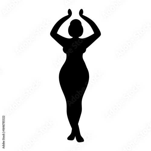 Silhouette of a Woman in Yoga Pose with Arms Raised Upward