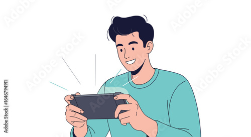 Young man happily playing video games on a portable handheld device