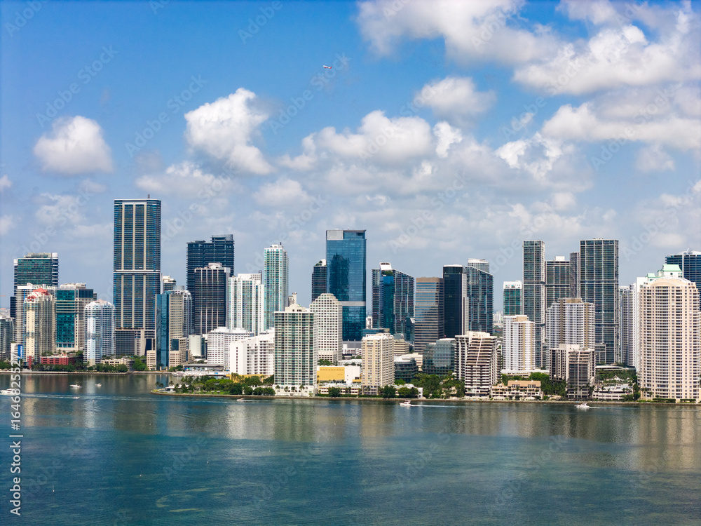 Fototapeta premium Aerial view of Brickell skyscrapers. Modern cityscape of downtown Miami. Panoramic Miami skyline above the coastline.