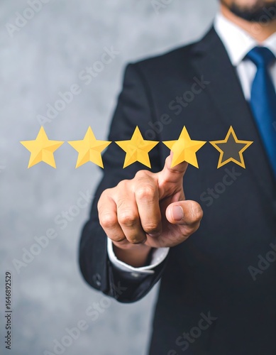 Man in suit interacts with four stars, one darkened, indicating feedback or rating
