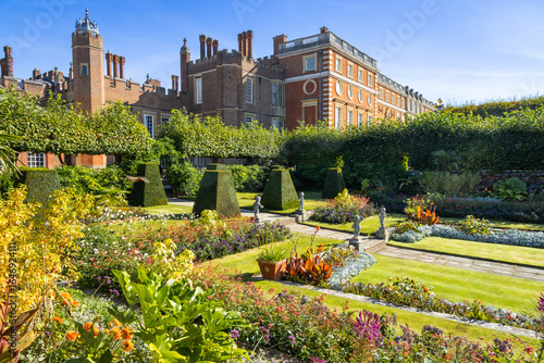Sunken gardens of Hampton Court Palance and set against its Georgian and Tudor facades