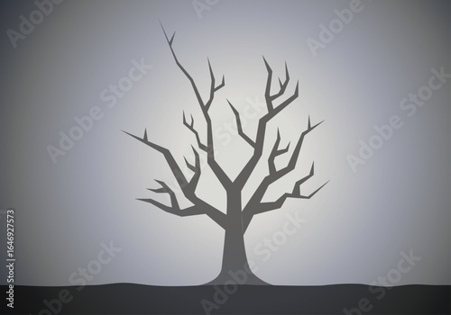 Árbol tenebroso de ramas secas en un descampado 